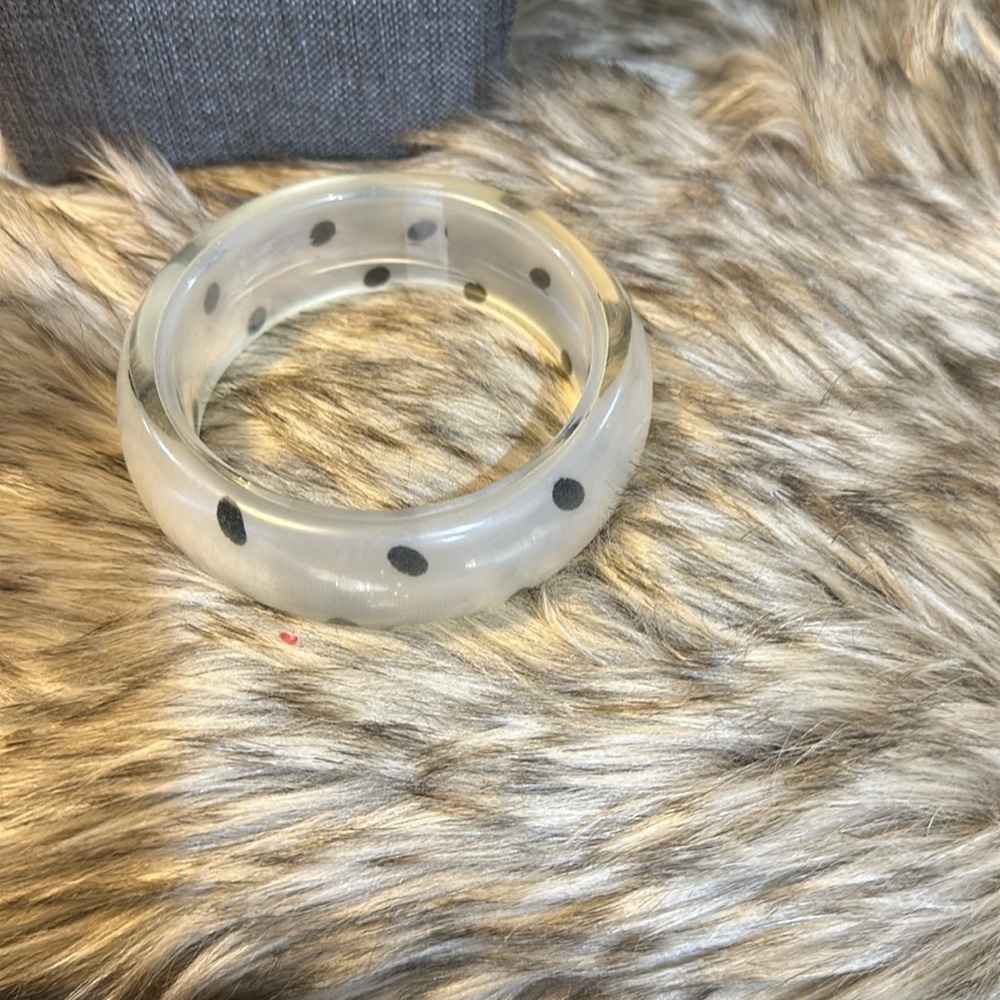 Bracelet, lucite. Vintage blue site bracelet clear white with black dots.